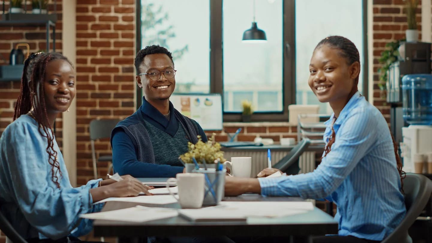 African researchers and professionals collaborating around a table